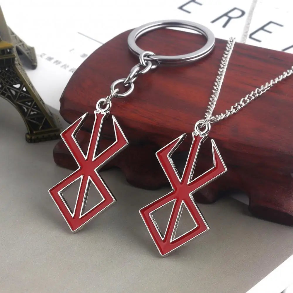Japanischer Anime-Spiel-Schlüsselanhänger aus roter Emaille – Anhänger mit Berserker-Symbol aus Legierung, Cosplay-Schmuck und Wikinger-Geschenk