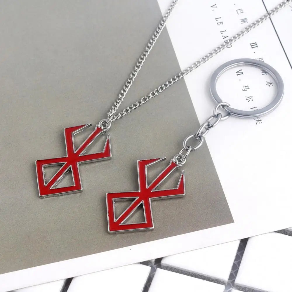 Japanischer Anime-Spiel-Schlüsselanhänger aus roter Emaille – Anhänger mit Berserker-Symbol aus Legierung, Cosplay-Schmuck und Wikinger-Geschenk